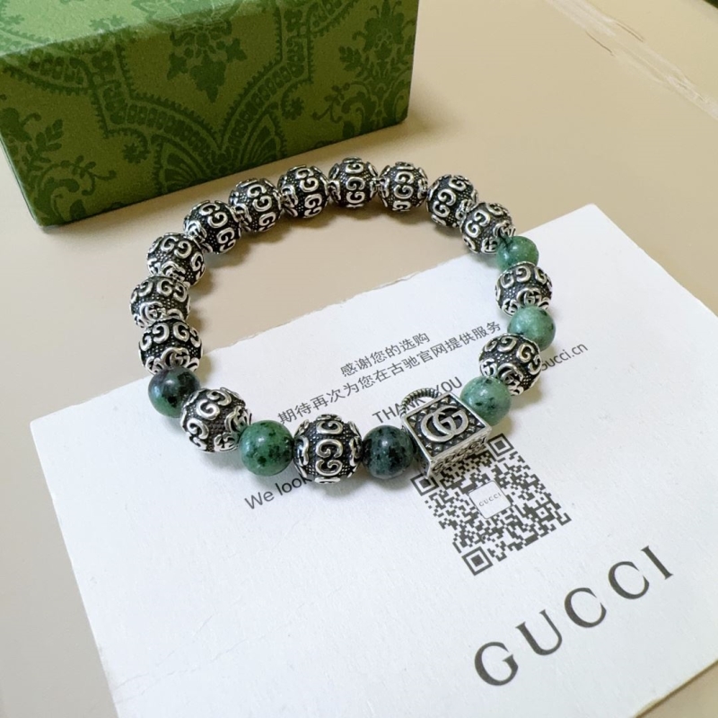 G*u*i bracelets